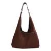 2026 Nova Bolsa de Ombro Única em Couro Macio Estilo Retrô de Nicho Feminina Grande Capacidade Bolsa Tote para o Dia a Dia Versátil da Moda Bolsa de Axila