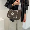 Bolso tote artístico y elegante, perfecto para ir al trabajo y para uso casual, nueva colección de otoño, diseño bordado, bolso cruzado versátil, estilo retro de un solo hombro, 2026