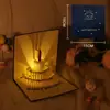 Tarjeta de felicitación de cumpleaños tridimensional creativa DIY de alto nivel tallado en papel hecho a mano regalo bendición música fuegos artificiales luminosos tarjeta