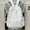 Mochila nueva de estilo bosque, alta apariencia, fresca, dulce y linda con estrellas, para estudiantes de secundaria y preparatoria, bolsa ligera y simple de doble hombro