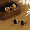 2024 Nuevos Pendientes Ovalados de Piedra Ojo de Tigre Diseño Retro Único Pendientes Únicos de Acero de Titanio para Mujer Fabricante Venta al por Mayor