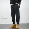 Calça casual preta masculina solta plus size cintura elástica amarrada no tornozelo emagrecendo outono e inverno vestido de lã macacão grosso