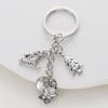 Serie temática navideña europea y americana 2021 Regalo de Navidad árbol de Navidad calcetines de copo de nieve llavero de trineo de campana