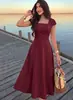 2026 Nuevo Vestido de Longitud Media Estilo Europeo y Americano Amarillo Ganso Cuello Cuadrado Mangas Cortas Cintura Alta Dobladillo Amplio Color Sólido Línea A Largo