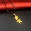 Ojos chapados en oro de imitación de 24 quilates colgante pequeño de pez dorado incrustado con diamante rojo moda femenina marketing Regalos Mayoreo