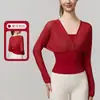 Nueva Ropa de Yoga con Sentido de Diseño Hueco Manga Larga Cintura Ceñida Adelgazante Chaleco Deportivo para Mujer Otoño/Invierno Top de Baile y Fitness