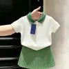 Estilo Coreano Meninas 2026 Verão Novo Branco Malha Trançada Gola Polo Manga Curta Menininha Verde Saia Plissada Média