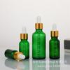 Botella de vidrio verde con gotero oscuro de 5 a 100 ml con escala, venta al por mayor, para aceites esenciales, esencias líquidas, cosméticos, subembotellada.