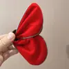Pinza para el pelo de tiburón de moda de terciopelo con borde blanco, forma de mariposa negra flocada, Rojo de Año Nuevo 2025, Pasador de Otoño e Invierno para Mujer