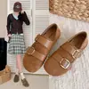 Sandalias planas casuales con tira de doble hebilla para mujer 2026 verano nuevo estilo retro ins uso exterior suela gruesa antideslizantes frescas zapatos de una sola pieza