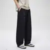 Pantalones casuales de color liso para hombre, nuevos pantalones de marca rectos versátiles y modernos de verano 2026, pantalones curvos modernos