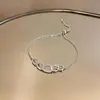 Pulsera Sencilla de Tirar con Hebilla de Herradura de Circonita Transfronteriza Europea y Americana, Pulsera Versátil, Elegante Accesorio de Mano para Mujer