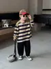 Camiseta para Niños Primavera y Otoño 2025 Nueva Rayada Camiseta Básica para Bebé Niño Elegante Moderna Top de Otoño para Niños Tendencia