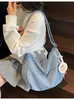 Bolso de mezclilla transfronterizo para mujer Gran capacidad 2025 Nuevo verano Versátil Nicho Un solo hombro Bandolera Bolso dumpling para ir al trabajo