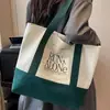 Bolso de lona transfronterizo para mujer, nuevo bolso de hombro grande, simple y elegante, bolso de mano versátil estilo coreano para el día a día