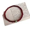 Pulsera de cuentas de jade de imitación rojo granate chino, más cálida como el jade, nueva pulsera retro simple de alta gama para mujer