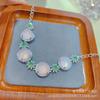 Suministro directo de fábrica pulsera de calcedonia blanca hielo alto copo de nieve yang verde hielo polvo tres colores superficie huevo con incrustaciones pulsera jade al por mayor