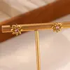 Pendientes de acero inoxidable con girasol transfronterizos para mujer, frescos y de lujo ligero, compactos y elegantes, nuevo estilo de moda que no se decolora