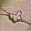 Fanjia versión superior collar pequeño de mariposa y nácar blanco, cadena para clavícula para mujer, chapado en oro de 18 quilates, pulsera de trébol de cuatro hojas de lujo ligero fábrica