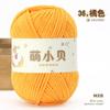 50.00g 1 volumen lindo bolsa tejida a mano de chenilla dorada de Beckham muñeco bolsa de material de ganchillo bola de lana al por mayor