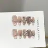 Puntas de uñas rosas hechas a mano de alta gama con un estilo suave, europeo y americano, con diseños de corazón, lazo y oso
