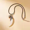 Colgante de Resina Diente de Lobo Collar Audaz para Hombre con Cordón de Cuero Encerado Imitación Diente de Mastín Tibetano Negro Estilo Cabeza de Lobo - Colgante