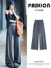 Calça de moletom feminina estilo americano cinza-pedra de cintura baixa, nova coleção outono 2026, modelagem solta, que afina a silhueta, estilo casual, calça pantalona com caimento fluido