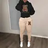 Novo conjunto de moletom com capuz casual de comércio exterior marca de moda conjunto de moletom estampado com cabeça de urso tamanho europeu moletom