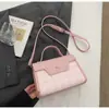 Bolso de mano de diseño nicho transfronterizo 2026 nuevo popular versátil para mujer bolso de hombro moderno bolso cruzado de alta gama