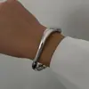 Pulseira Exagerada Brilhante de Design Irregular Transfronteiriça Europeia e Americana para Mulheres Liga de Metal Gota d'Água Mola Pulseira Conjunto