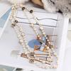 Collar de Perlas para Mujer Largo Moda Corea del Sur Dongdaemun Estilo Pequeño Fragante Cadena Colgante Multicapa Negro y Blanco Camelia Decorativo Cadena de Lana