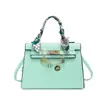 Bolso de mujer de nicho de alta gama 2026 nuevo de primavera vintage versátil bandolera bolso de mano versátil casual bolso tipo Kelly