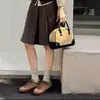 Zapatos casuales de mujer de estilo europeo, novedad otoño 2026, zapatos de moda de cuero de caña baja, zapatillas de gamuza para mujer estilo alemán