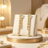 Brincos de franja luxuosos e sofisticados banhados a ouro 18K, acessórios de orelha com zircônia que realçam os traços faciais, versáteis tanto para o trabalho quanto para festas