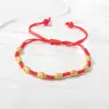 Pulsera trenzada de cuentas de flor cortada del año zodiacal popular al por mayor Anillo passepartout transfronterizo Pulsera de regalo pequeño para pareja estudiante