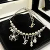 26 Estilos Nuevos de Pulseras de Camelia con Múltiples Elementos Inspiradas en Chanel, Elegantes Pulseras de Moda de Lujo con Perlas, Ventas Directas de Fábrica, Artículos de Alta Venta