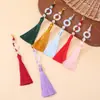 Estilo nacional borla fleco bucle anillo de correr cierre de langosta borla accesorios de decoración de ropa colgante de abanico borla colgante Hanfu broche pequeño colgante