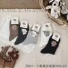 Calcetines Deportivos de Caña Alta para Mujer, Calcetines de Dibujos Animados de Alta Elasticidad, Calcetines de Algodón Peinado Todo en Uno Nai Fu Kelu Li Venta al por Mayor