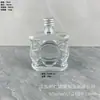 Al por mayor en stock 50ml Copa de Vidrio Plana Botella de Vino Botella de Vidrio Blanco Alto con Tapa de Aluminio a Juego Suministro Botella Pequeña de Vino Tinto con Tapa