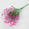 Spot Amazon flor artificial Camelia de siete pétalos flor de plástico falsa gypsophila arreglo floral decorativo de rosas