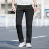 Calças Casuais Respiráveis Elásticas para Jovens Homens 2026 Nova Coleção Primavera e Verão Algodão Puro Slim Reto Calças Longas Masculinas