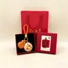 Chaveiro Pingente Dourado do Ano da Ovelha com Decoração em Folha de Ouro Conjunto em Caixa de Presente Personalizado para Negócios Presente Personalizado Atacado