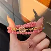 Nuevo Estilo Chino Moderno y Exquisito Pulsera de Piedra Natural con Cuentas de Goteo de Aceite Rosa Colorida Pulsera de Lujo Ligero de Alta Gama para Mujer