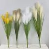 Venta al por mayor de fábrica planta verde artificial paisajismo decorativo hierba cola de perro cinco cañas cebolla hierba flor artificial ramo adornos