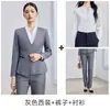 Elegante conjunto de traje y falda azul marino con cuello en V que ciñe la cintura, ropa de trabajo para recepcionista de hotel, nueva colección otoño 2026 para mujer profesional