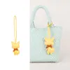 Nuevo Colgante de Gato de Cuero con Borlas Accesorio de Moda para Bolso Llavero de Bufanda de Seda Coreana Colgante para Mochila