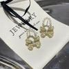 Pendientes de lazo de perlas de primavera temprana, aguja de plata S925, versátiles, elegantes, modernos, para dama, suaves, micro incrustaciones de circonita