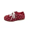 Zapatillas de entrenamiento alemanas retro de cordones planos para mujer, nuevo modelo popular de otoño 2026, zapatillas casual versátiles de lunares que aumentan la altura