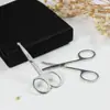 Al por mayor en stock Tijeras Redondas para Vello Nasal de Uso Doméstico Herramientas de Maquillaje Pegatinas para Doble Párpado Tijeras Pequeñas Especiales Tijeras de Maquillaje de Acero Inoxidable