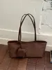 Moda minimalista coreana y japonesa 2026 verano nuevo para mujer de alta gama versátil para ir al trabajo nicho bolso de mano de un solo hombro bolso tote